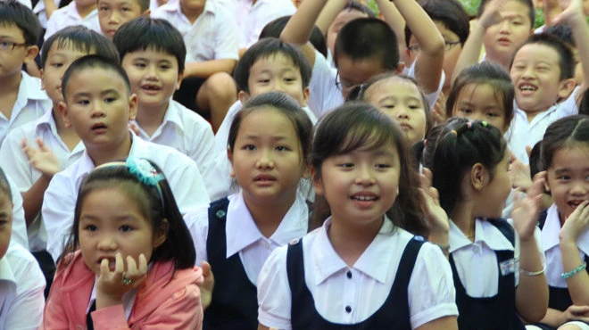 Học sinh TP.HCM trong ngày khai giảng năm học mới - Ảnh tư liệu TT