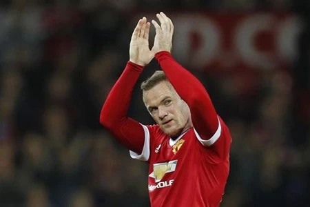 Rooney phản pháo thầy cũ Ferguson ảnh 1