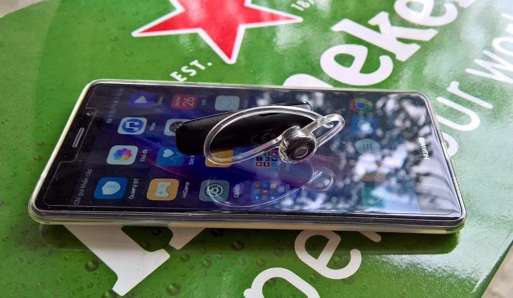 Biến tai nghe bluetooth thành nút bấm chụp ảnh từ xa ảnh 1