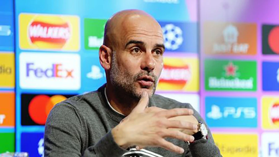Pep Guardiola nói về việc đội ngũ nhân viên Man City chăm sóc 24/7 cho Haaland. ẢNH: MIRROR