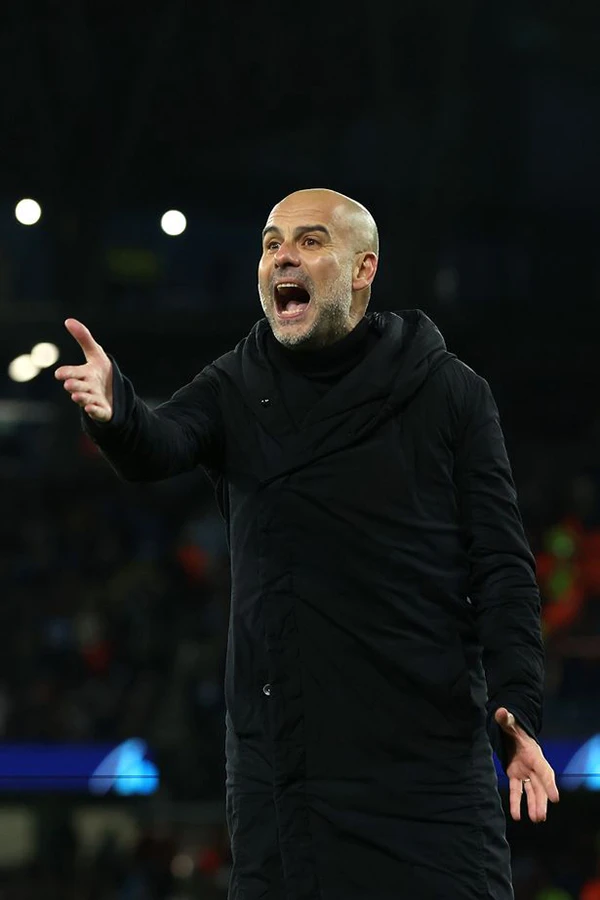 HLV Pep Guardiola đang hướng đến cú ăn ba lịch sử cùng Man City. ẢNH: GETTY