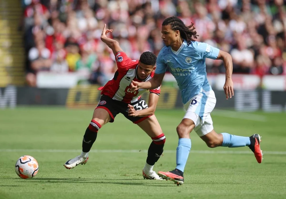 Sheffield chứng tỏ mình không phải là đội bóng dễ bắt nạt khi gây ra rất nhiều khó khăn cho Man City. Ảnh: Getty