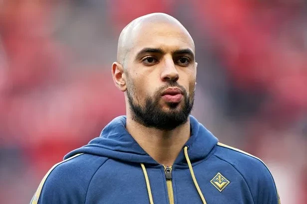 Amrabat thể hiện tình yêu bất diệt với MU. ẢNH: GETTY