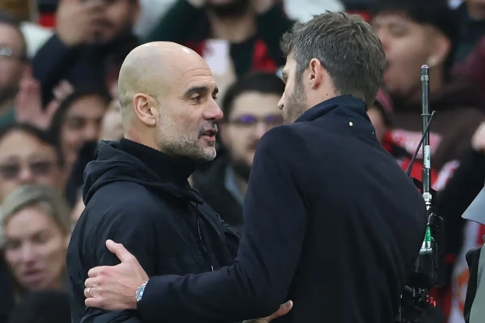 mu-man-city-guardiola-carrick.jpg