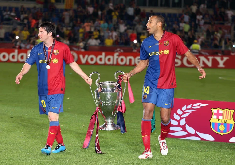 messi-henry.jpg