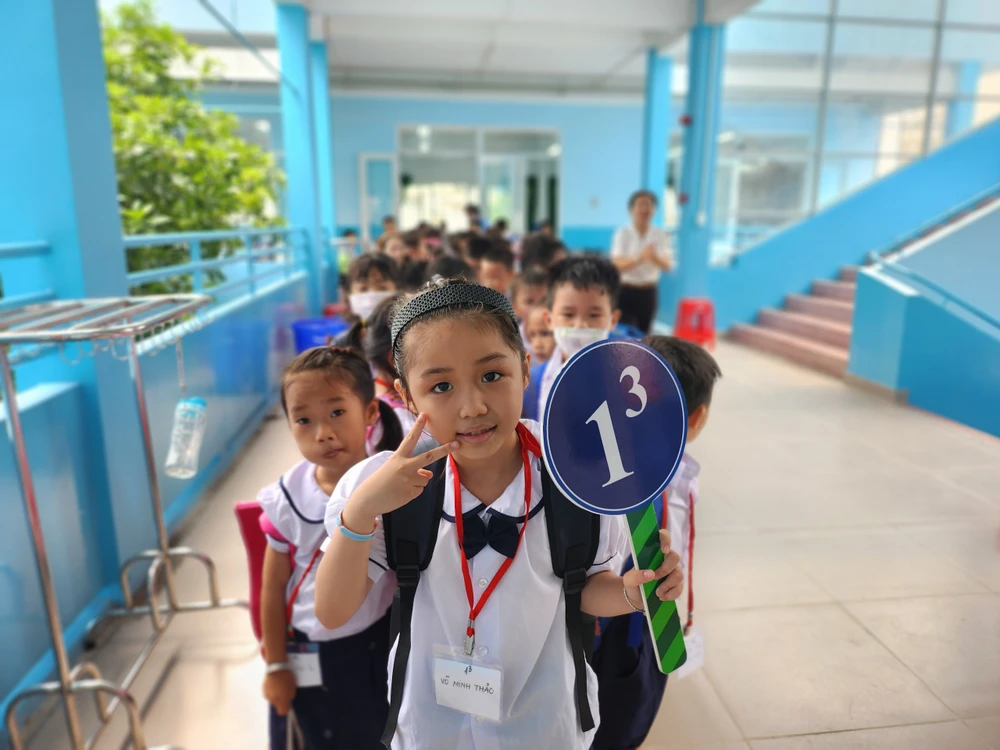 Học sinh lớp 1 Trường Tiểu học Thái Hưng, quận 8. Ảnh: NGUYỄN QUYÊN