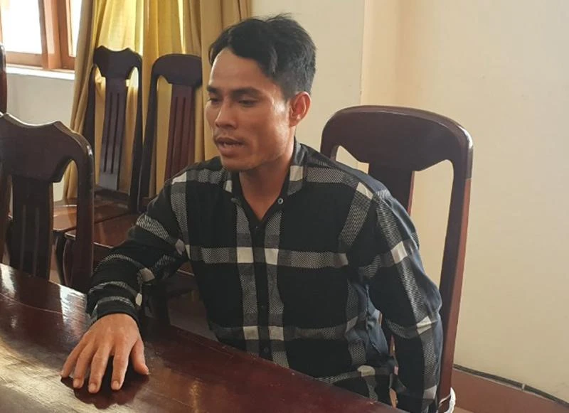 Nghi can Đoàn Minh Hải tại cơ quan công an. Ảnh: TẤN LỘC