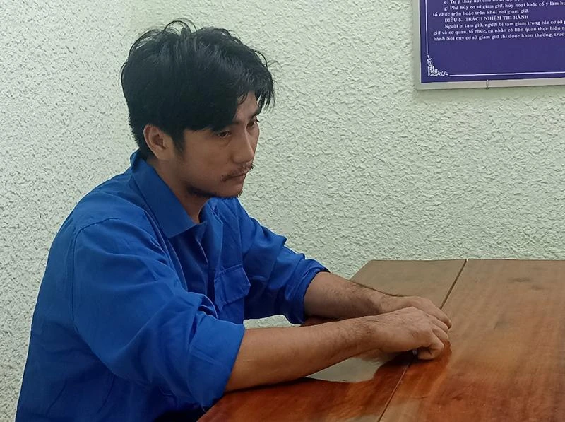 Trần Hữu Dương tại cơ quan công an. Ảnh: HT