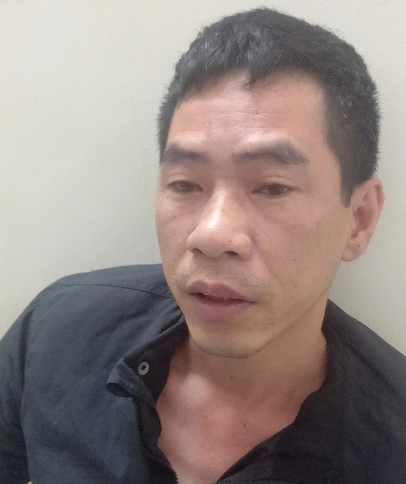 Trần Minh Đạt, người cầm đầu đường dây cá độ bóng đá qua mạng. Ảnh: CACC