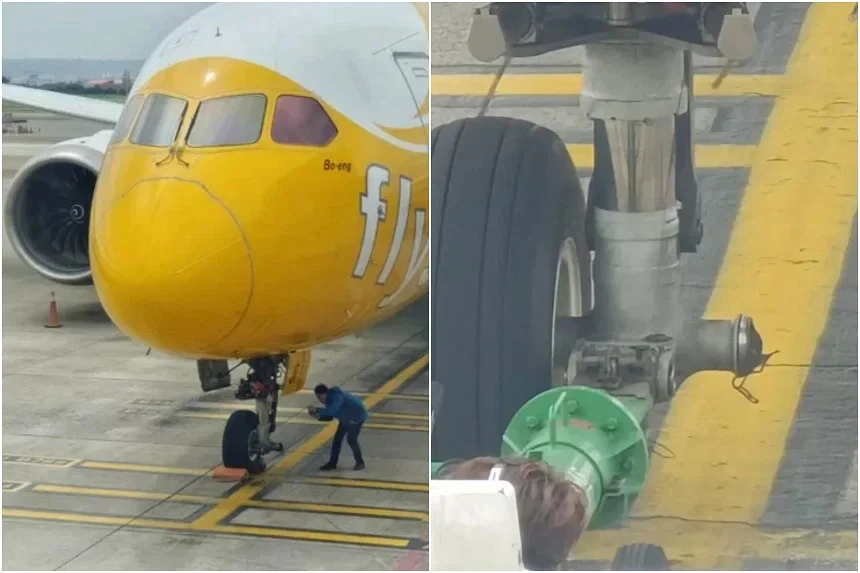 Bánh trước bên trái của máy bay bị rơi ra. Ảnh: UNITED DAILY NEWS