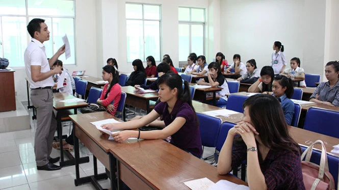 Thí sinh dự thi vào Trường ĐH Sư phạm TP.HCM năm 2014 - Ảnh: Minh Giảng