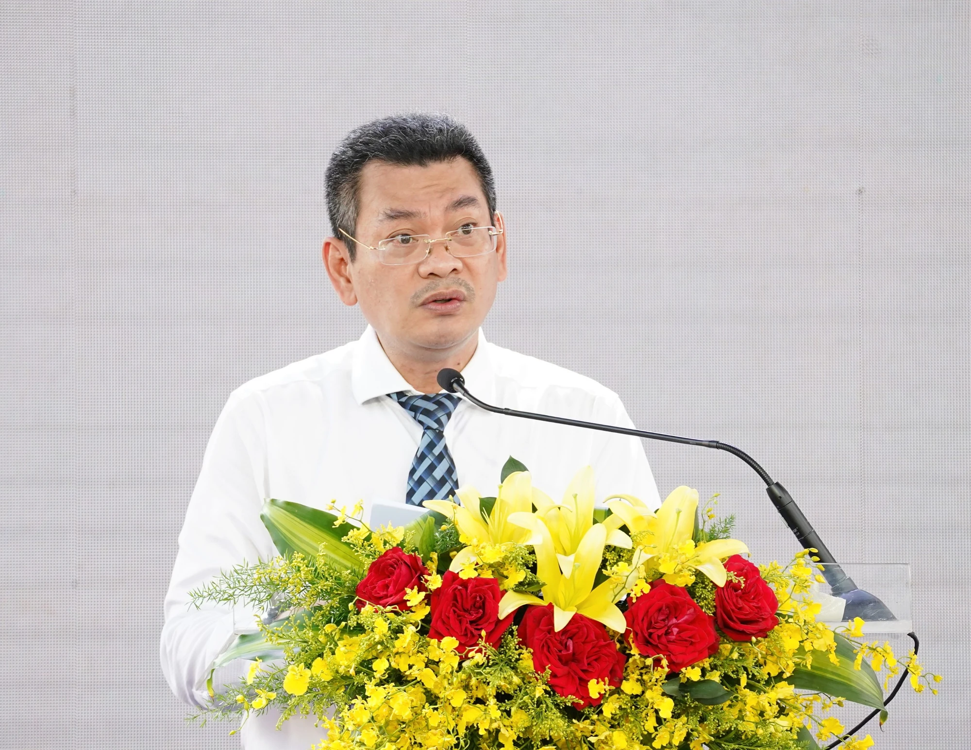 Ông Hoàng Minh Tuấn Anh, Chủ tịch UBND quận 7 phát biểu. z4757812620367_18fe4e4c1b8f09451baae761d647459d.jpg