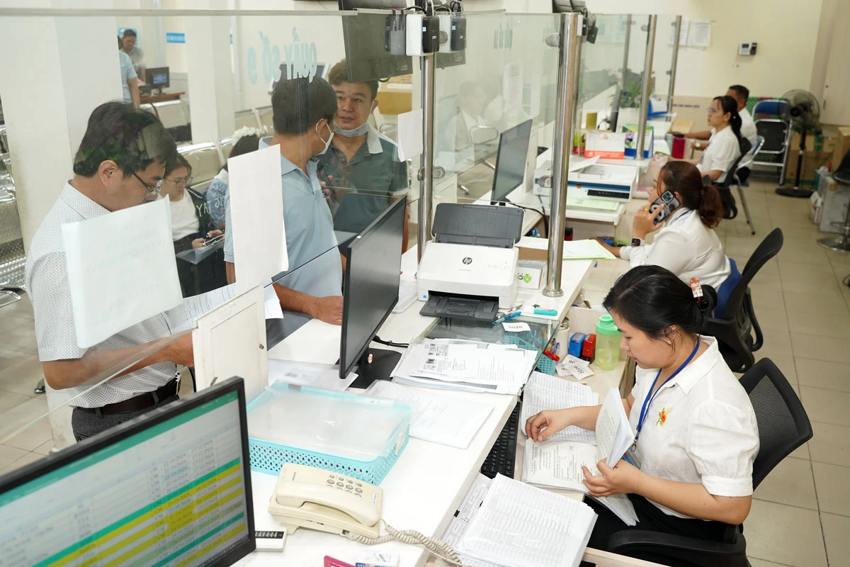 Khi sắp xếp lại phường, xã, TP.HCM phải có kế hoạch để máy giữ lại những cán bộ có năng lực, có đức, có tài và tận tâm với dân. Ảnh: THUẬN VĂN p3-y-kien-sap-nhap-phuong-xa-tp.jpg