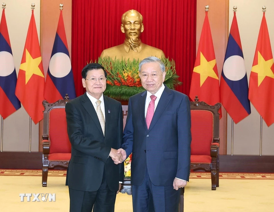 tong-bi-thu-to-lam-gap-tong-bi-thu-chu-tich-nuoc-lao-thongloun-25-1.jpg
