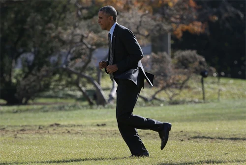 Obama vội vã quay trở lại. Obama-1-6063-1416799519.jpg