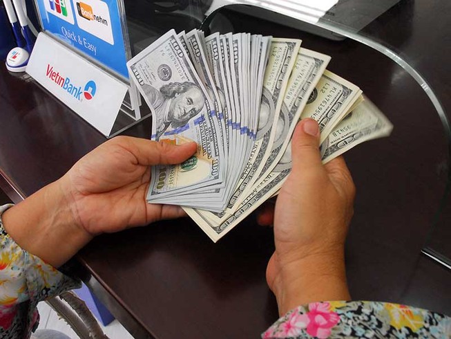 Mỹ tăng lãi suất: Vàng xuống đáy, USD lên ngôi