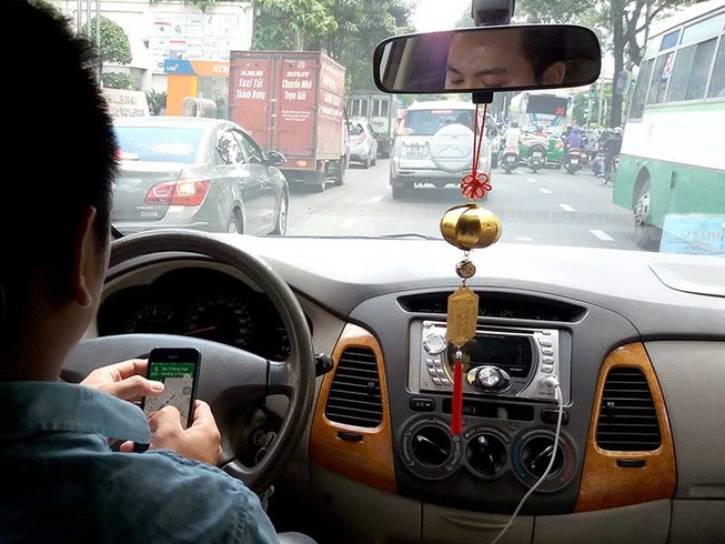 Các bộ ý kiến trái chiều về Uber, Grab