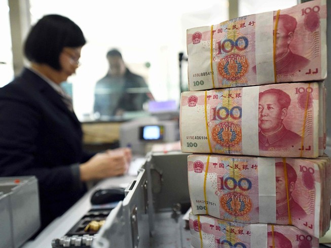 Trung Quốc hạ giá nhân dân tệ để đối phó Mỹ