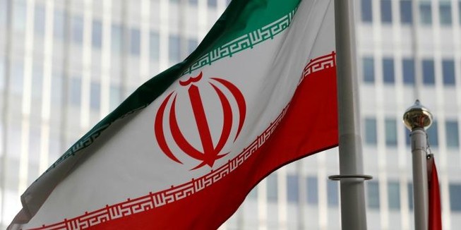 Cờ Iran trước trụ sở Cơ quan Năng lượng Nguyên tử Quốc tế (IAEA) tại Vienna, Áo, ngày 4-3 năm 2019. Ảnh: Reuters