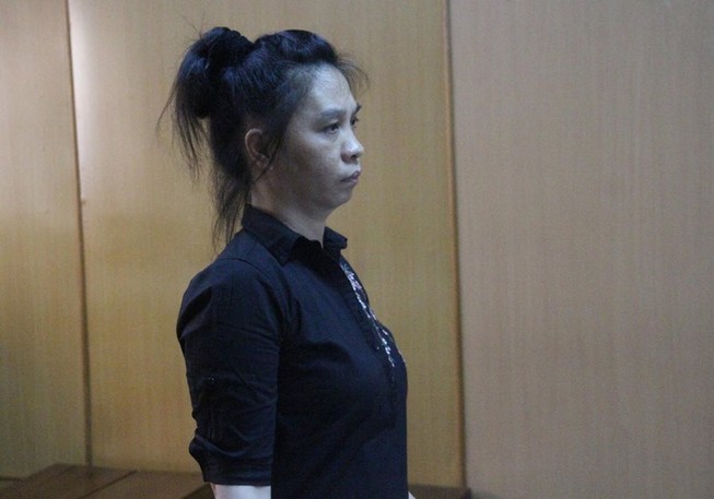 Nữ đội trưởng thuế nhận bọc tiền trăm triệu từ công ty lãnh án
