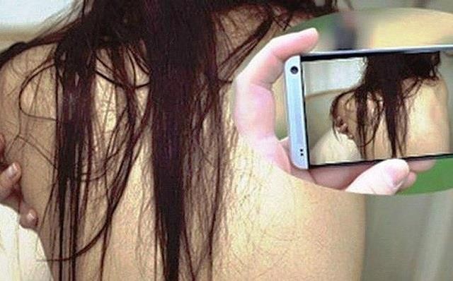 Tung clip nóng dọa bạn tình, bị dính tội làm nhục người khác
