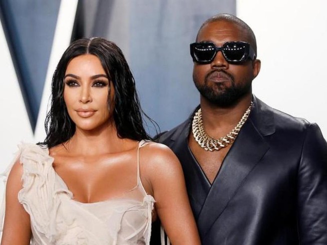 Vợ chồng Kanye West và Kim Kardashian - Ảnh: REUTERS