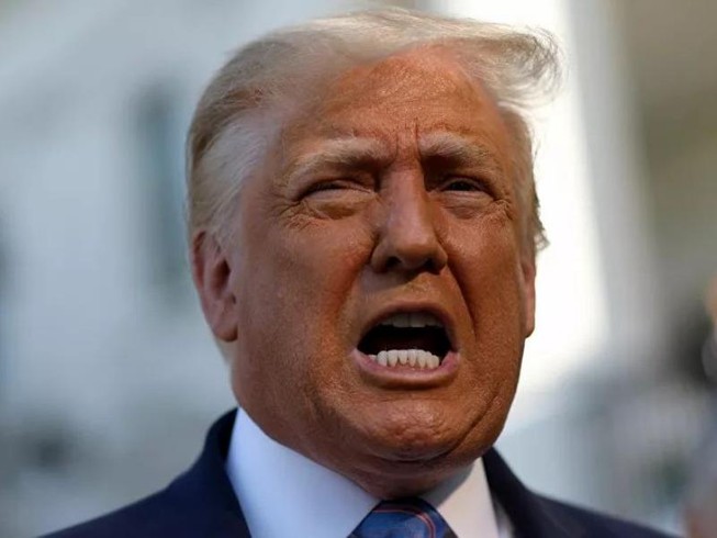 Ông Trump hứa sẽ đáp trả thích đáng nếu thông tin Nga đã trao tiền thưởng cho Taliban là thông tin chính xác. Ảnh: REUTERS/SPUTNIK