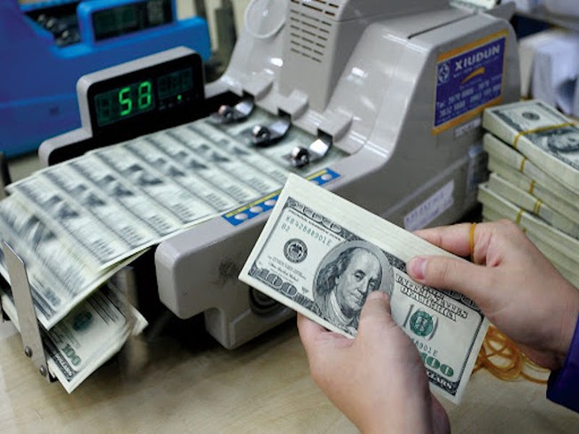 Tỉ giá USD trồi sụt thất thường