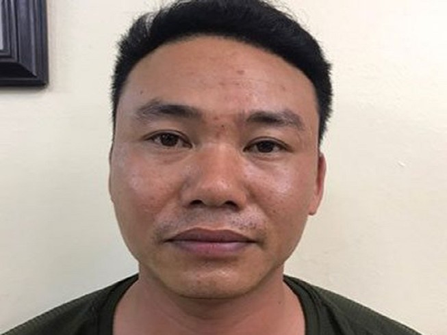 Nguyễn Mạnh Quân tại cơ quan điều tra. Ảnh: CACC