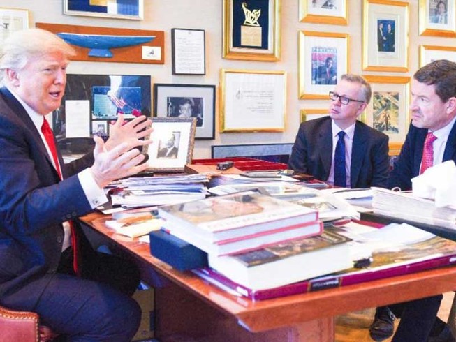 Ông Trump chê bà Merkel và NATO