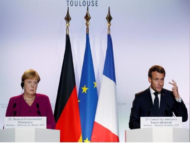 Thủ tướng Đức Angela Merkel và Tổng thống Pháp Emmanuel Macron trong một cuộc họp báo hồi tháng 10-2019. Ảnh: REUTERS