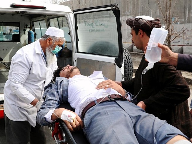 Các tay súng IS đã nổ súng trong một lễ tưởng niệm ở thủ đô Kabul, Afghanistan làm 113 người thương vong. Ảnh: REUTERS