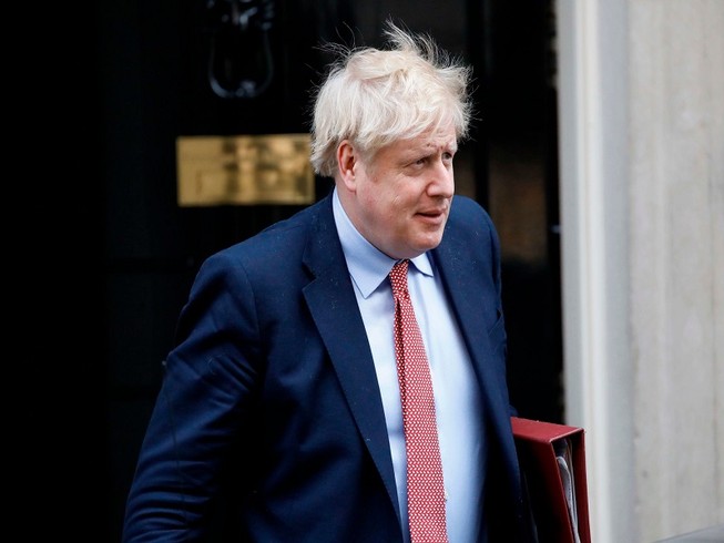 Thủ tướng Anh Boris Johnson tại Văn phòng Thủ tướng hồi giữa tháng 3 trước khi ông bị nhiễm COVID-19. Ảnh: THE NEW YORK TIMES