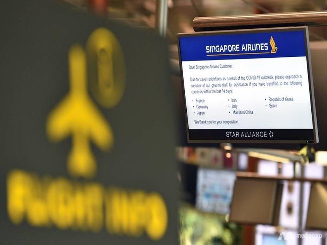 Bảng thông tin chuyến bay của hãng Singapore Airlines tại sân bay Changi. Ảnh: MMEDIACORP