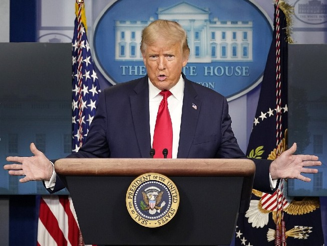 Tổng thống Mỹ Donald Trump trong buổi họp báo ngày 14-8 tại Nhà Trắng. Ảnh: AP