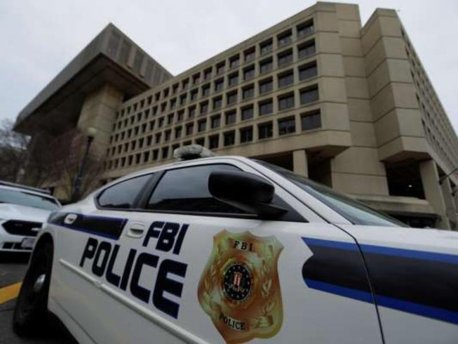 Xe cảnh sát đậu bên ngoài trụ sở FBI ở thủ đô Washington DC, ngày 1-2-2018.