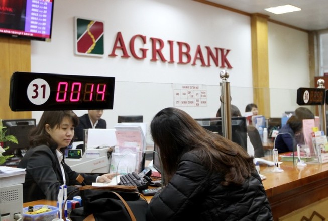 Agribank quyết tâm cùng ngành ngân hàng xử lý nợ xấu