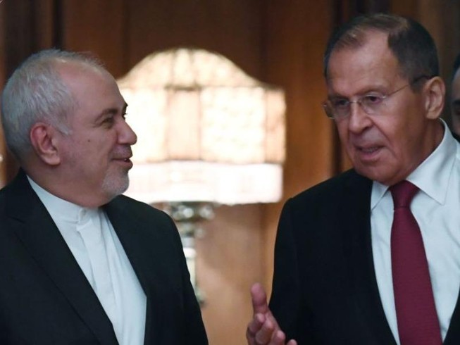 Ngoại trưởng Nga Sergei Lavrov (trái) gặp Ngoại trưởng Iran Mohammad Javad Zarif (phải) tại Moscow ngày 30-12. Ảnh: SPUTNIK
