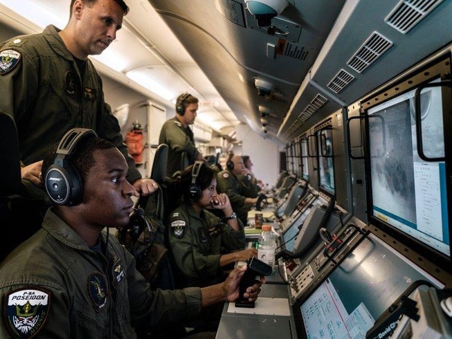 Bên trong một chiếc máy bay do thám P-8A Poseidon của Hải quân Mỹ đang giám sát hoạt động của Trung Quốc ở biển Đông năm 2018. Ảnh: NEW YORK TIMES