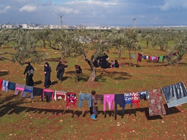 Những người tị nạn Syria tại một trại mới dựng ở tỉnh Idlib hôm 22-2. Ảnh: GETTY