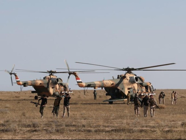 Các lực lượng an ninh Iraq truy bắt các tay súng IS ở tỉnh Anbar, Iraq hồi tháng 12-2019. Ảnh: REUTERS