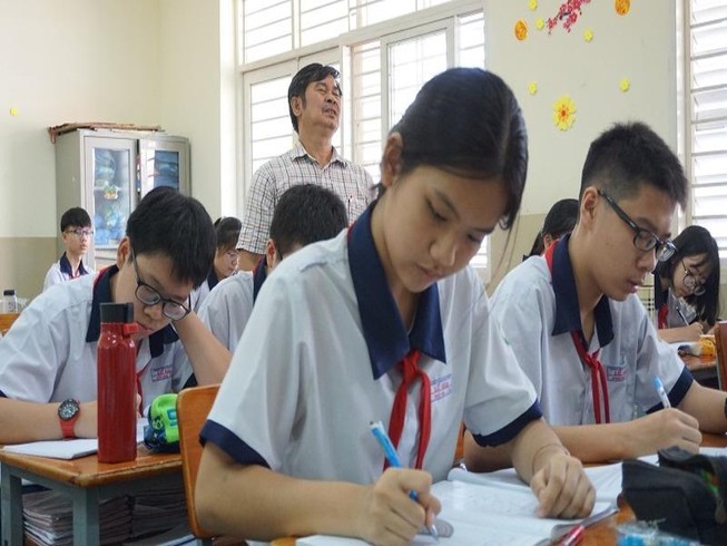 Học sinh trường THCS Lữ Gia, quận 11 trong một tiết học. Ảnh: NGUYỄN QUYÊN