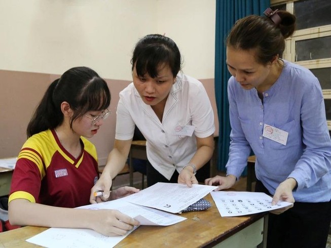 Thí sinh tham dự kỳ thi THPT quốc gia năm 2019. Ảnh: HOÀNG GIANG