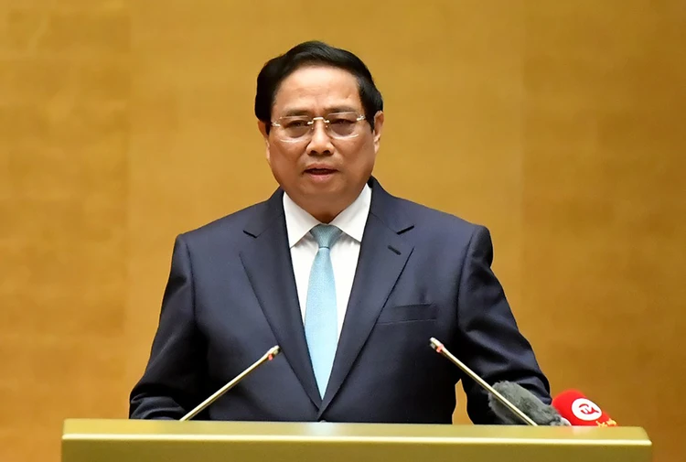 Thủ tướng Phạm Minh Chính báo cáo tình hình kinh tế - xã hội năm 2024. Ảnh: NHÂN DÂN thu-tuong-pham-minh-chinh-neu-ra-hang-loat-giai-phap-trong-nam-2025-de-buoc-vao-ky-nguyen-vuon-minh.jpg