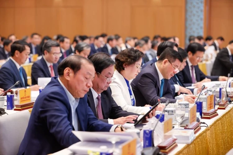 Các đại biểu tham dự hội nghị. Ảnh: VGP tong-bi-thu-uu-tien-hang-dau-la-doi-moi-quan-ly-kinh-te-tinh-gon-to-chuc-bo-may-1.jpg