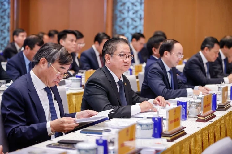 Các đại biểu tại hội nghị sáng 8-1. Ảnh: VGP tong-bi-thu-uu-tien-hang-dau-la-doi-moi-quan-ly-kinh-te-tinh-gon-to-chuc-bo-may-2.jpg