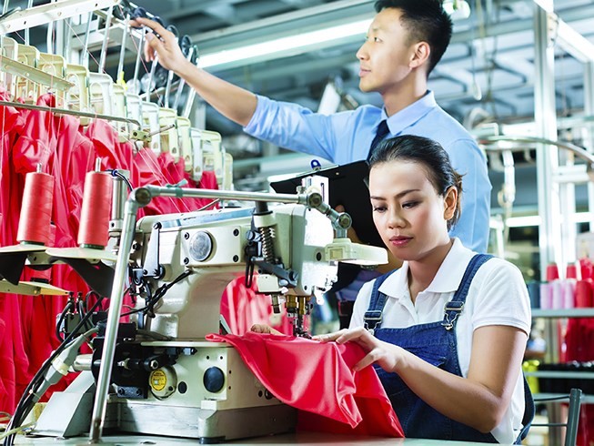 VN không nên hoảng hốt trước cuộc chiến thương mại Mỹ-Trung - ảnh 1