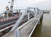 12 năm vắng bóng, hôm nay phà Rạch Miễu tái xuất trở lại ảnh 5 Có thêm phà tạm, cầu Rạch Miễu sẽ giảm kẹt xe dịp Tết