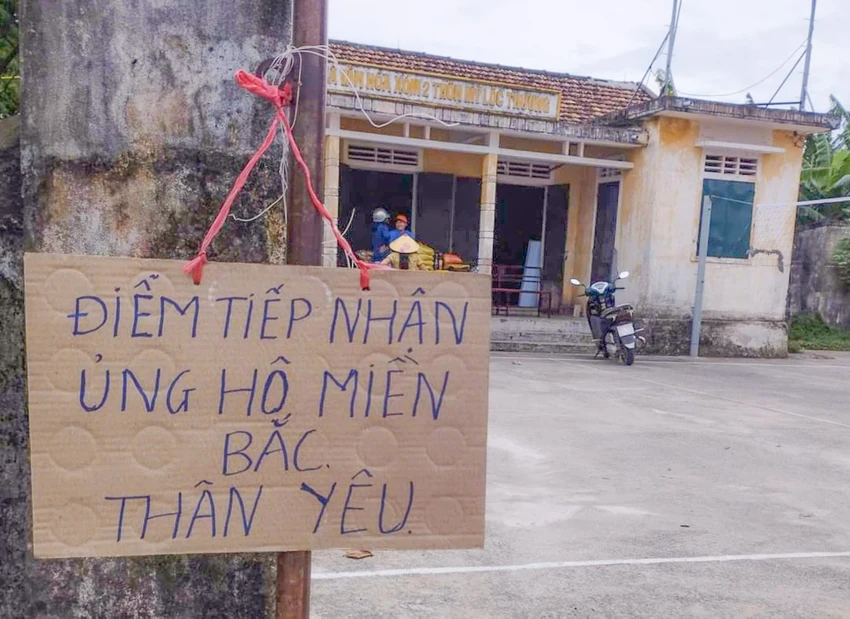 Nguoi-dan-quang-binh-dua-thuyen-may-ca-no-ho-tro-mien-Bac (2).jpg