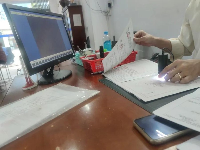 Các văn bản công chứng giấy được được chuyển đổi thành văn bản điện tử có chữ ký số hợp lệ cũng được coi là văn bản công chứng điện tử. Ảnh: NH công chứng điện tử